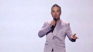 Robbie Williams supera a The Beatles y alcanza un récord histórico con BRITPOP
