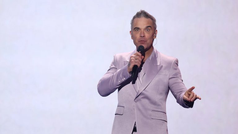 Robbie Williams supera a The Beatles y alcanza un récord histórico con BRITPOP